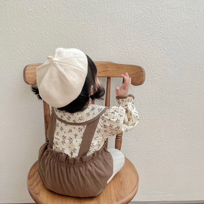 Back view of a baby girl in Autumn Princess romper – cosy newborn gift set