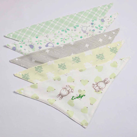 five pieces flat lay baby bib