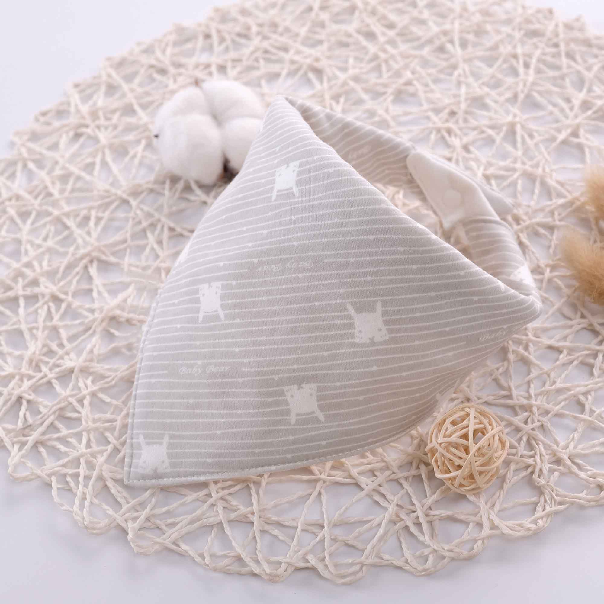 grey bunny bib display on a placemat