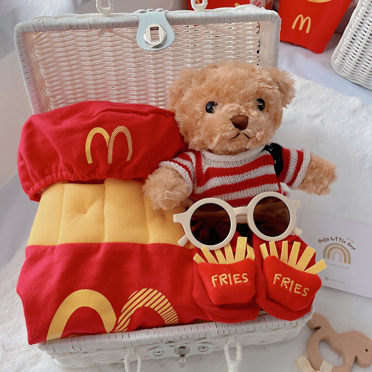 Mc Kidz premium baby gift set in a rattan basket with fries-inspired romper with matching hat and socks