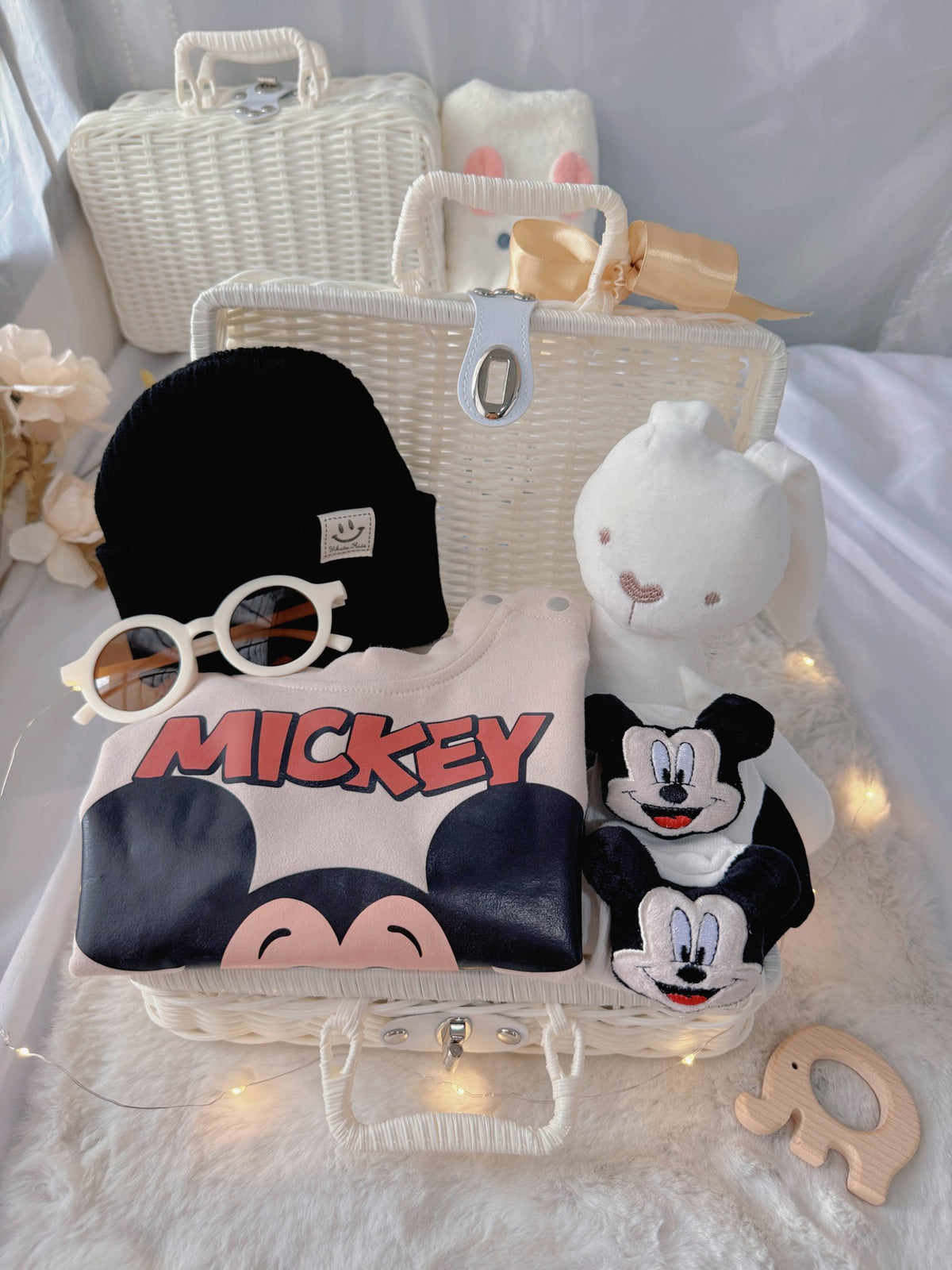 Mickey Pals premium baby gift set in a rattan basket with mouse-print romper with black beanie