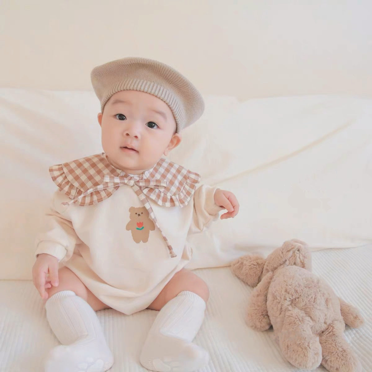 baby wearing a set of trendy clothes