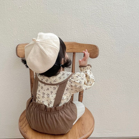 Back view of a baby girl in Autumn Princess romper – cosy newborn gift set