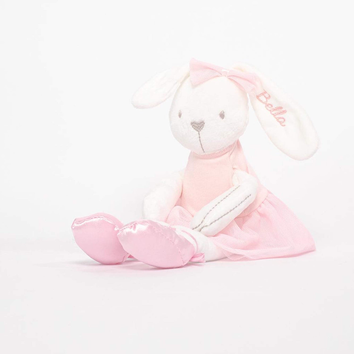 Pink Ballet dress bunny sitting infront of white background with the name embroidered.