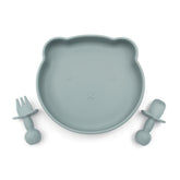 Gray BPA-free silicone plate shaped like a bear’s face, accompanied by matching fork and spoon, designed for babies.