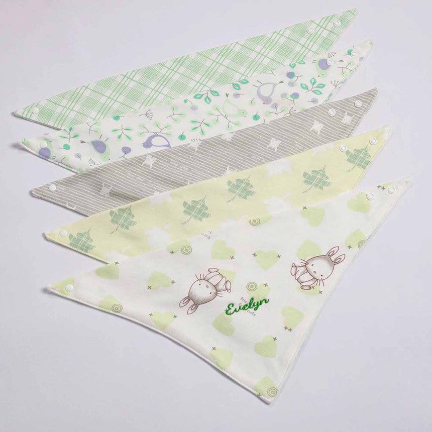 five pieces flat lay baby bib