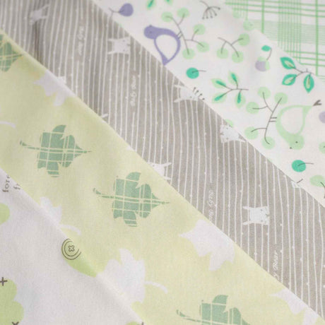 five pieces close up flat lay baby bib