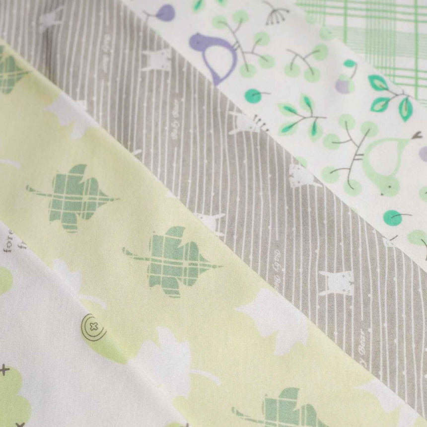 five pieces close up flat lay baby bib