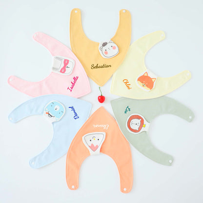 Six pieces different colour organic cotton baby bib display in circle with the name embroidered