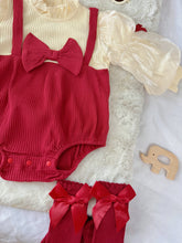 Red Riding Hood baby outfit flat lay – red romper with puff sleeves, bows and red beret