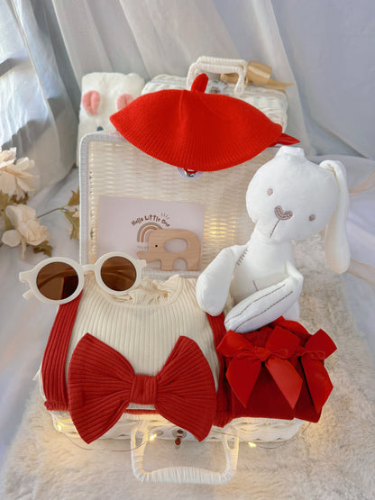 Red Riding Hood premium baby gift set in a rattan basket with red romper with puff sleeves, bows and red beret