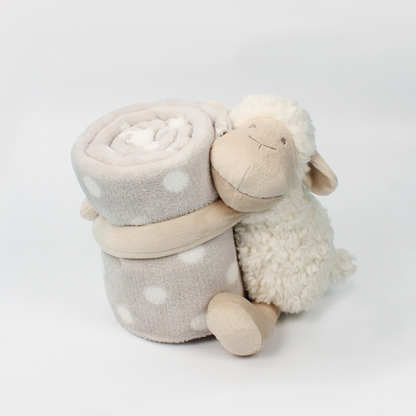Top view of a roll-up sheep design blanket with a plush sheep hugging the rolled blanket to keep it in place. The blanket features an embroidered baby&