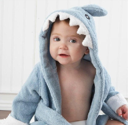 Baby showcasing the bathrobe clothing.